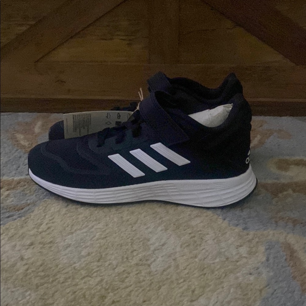 Adidas White and Black Low-Top Sneakers with Mesh Upper
